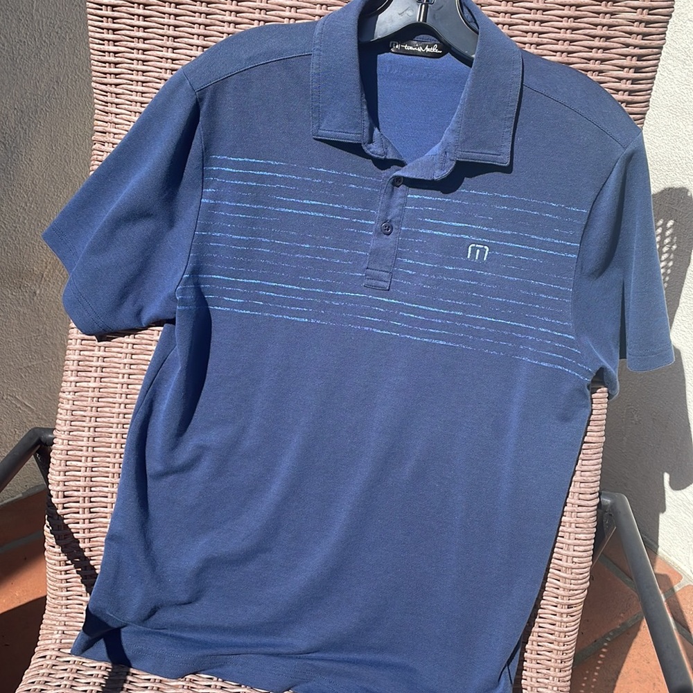 Travis Mathew broken chest stripe polo